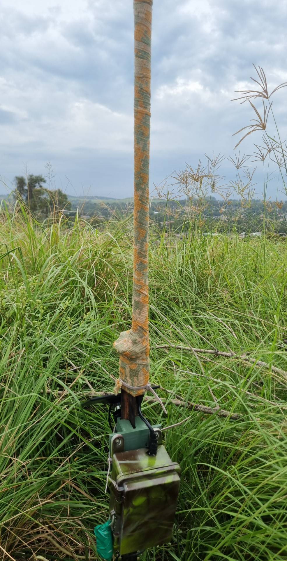 Camo tape and camo netting can also be used to hide a node